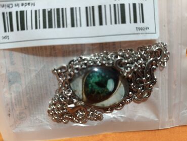 Наборы украшений: Набор бижутерии и аксессуаров Состав: - Брошь в форме пера — 14