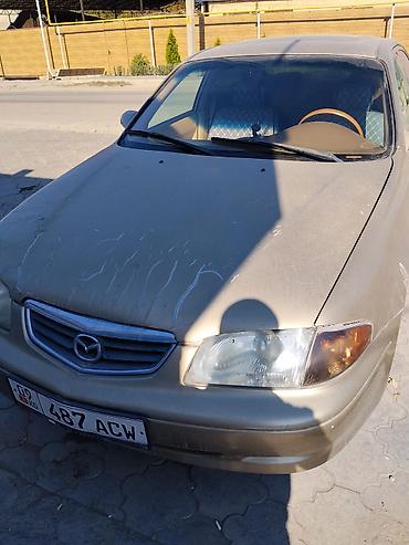 mazda 325: Mazda 626: 2001 г., 2 л, Механика, Бензин, Седан — 2