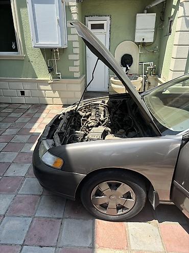 Nissan: Satılır: Nissan Altima * İl: 2001 * Yürüş: 254 835 mil * Mühərrik — 14