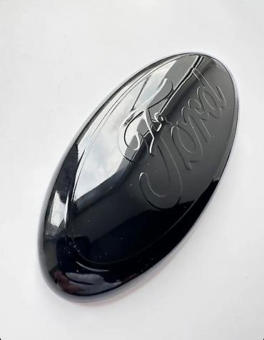 Emblemlər və nişanlar: Məhsul: Ford loqolu ön radiator emblemi (qara “blackout” dizayn) — 1