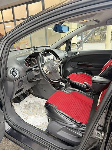bot kar: Opel Corsa D, hetçbek kuzov, 5 qapı, qara rəng. Əsas xüsusiyyətlər: - — 7