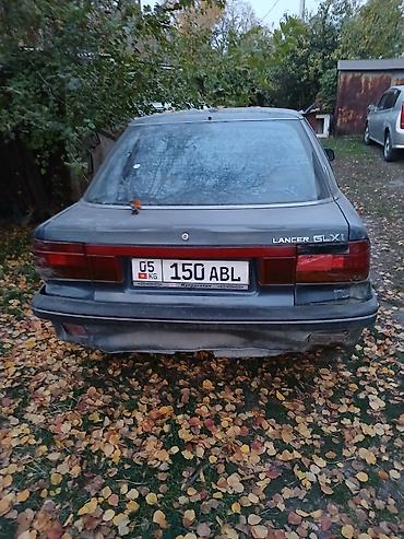 Mitsubishi: Mitsubishi Lancer: 1991 г., 1.3 л, Механика, Бензин, Хэтчбэк — 4