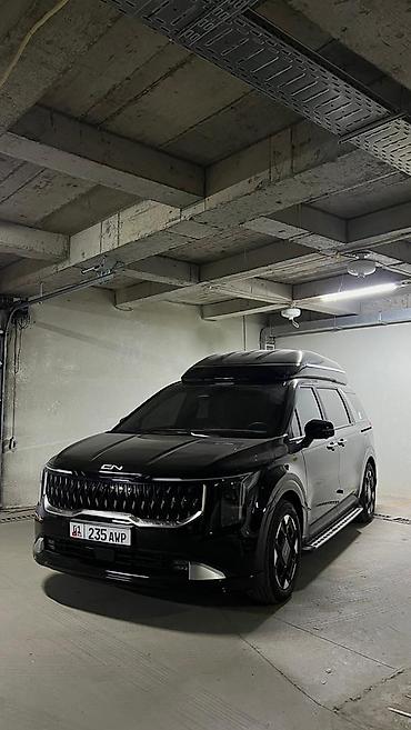 Kia: Kia Carnival: 2024 г., 1.6 л, Автомат, Гибрид, Минивэн — 1