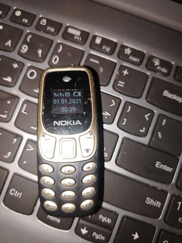 телефон fly ds107: Nokia 3310, цвет - Черный, Кнопочный