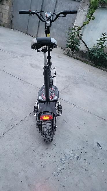 velosiped 28 per page 40: Elektrik skuter – oturacaqlı, güclü amortizasiya və tam işıqlandırma — 3