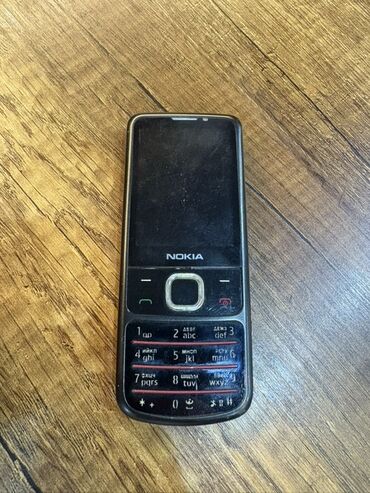 телефон fly stratus 8: Nokia 6700 Slide, цвет - Черный, Кнопочный