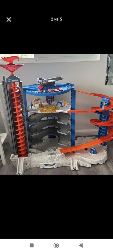 Uşaq geyimi və ayaqqabıları: 1000 manata alinib500 e satilir.Hot Wheels Super Ultimate Garage –