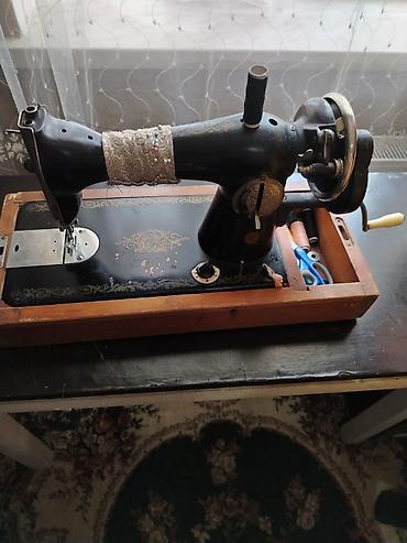 antik samdan: Məhsul: Mexaniki tikiş maşını (retro/klassik model) Təsvir: - Güclü — 2