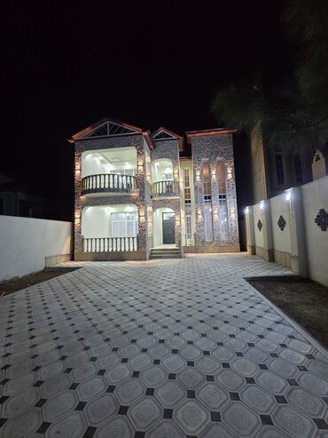 дом с цокольным этажом и гаражом: Maştağa qəs. 5 otaqlı, 250 kv. m, Yeni təmirli