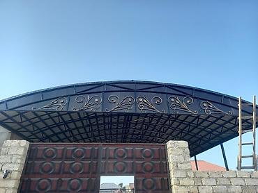 meheccer: Dəmir konstruksiyalı, tağ formasında geniş dam–üstü örtük və dekorativ — 2