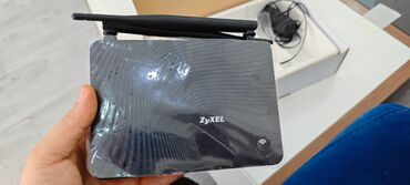 Modemlər və şəbəkə avadanlıqları: Həm ADSL modemdir həmdə optik router. İşlənməyib. Sadəcə yenisini