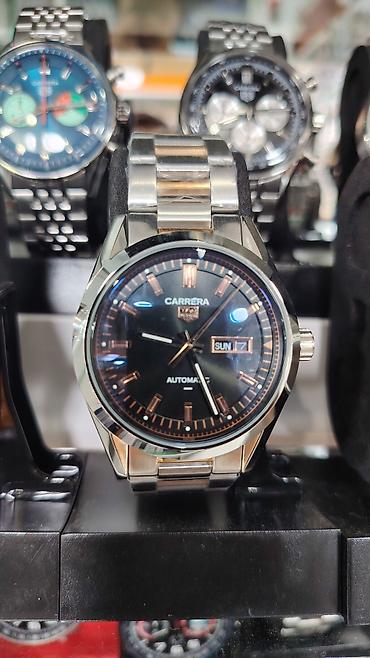 takı: TAG Heuer Carrera kolleksiyasından kişi qol saatları Xüsusiyyətlər: - — 3