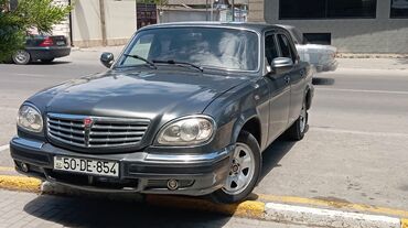 niva 4 qapi: QAZ Volga 31105 sedan - Kuzov: tünd boz rəng, 4 qapı, xrom ön