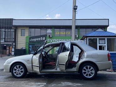 Mazda: Mazda 323: 2000 г., 1.5 л, Механика, Бензин, Седан — 10