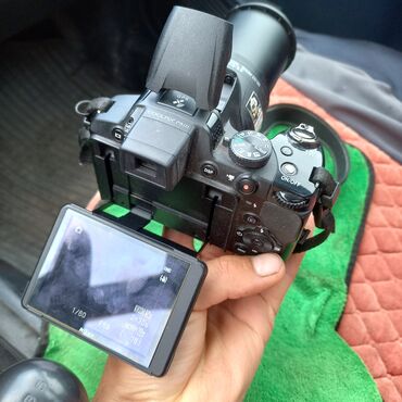палароид фотоаппарат: Фотоаппарат Nikon Coolpix P610 в черном цвете с мощным объективом и