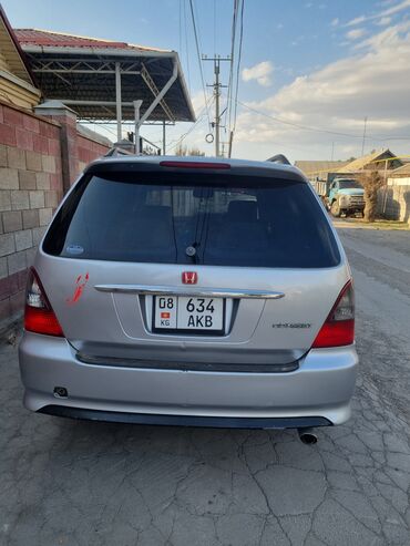 тойота ипсум диски: Серебристый минивэн Honda Odyssey, подходящий для семейных поездок и