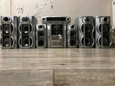 Mikrofonlar: Panasonic SC-VK91D model DVD stereo sistemi. Bu sistem ətraf səslər
