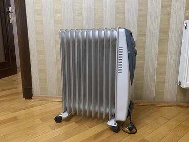qizdirici radiator: Qızdırıcı konvektor