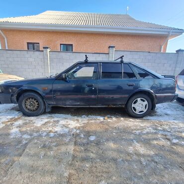 аралаш машиналар: Mazda 626: 1985 г., 1.9 л, Механика, Бензин, Хетчбек