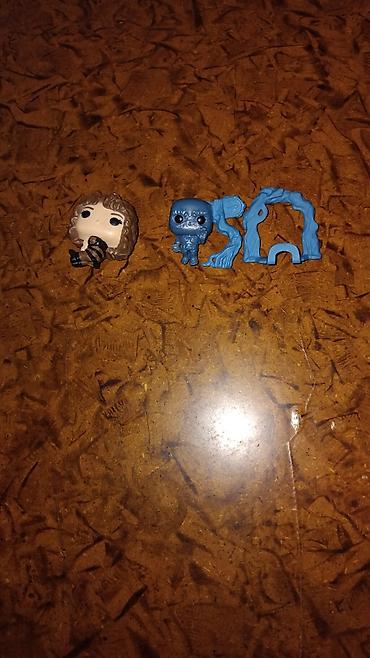 figure: Funko Pop üslubunda iki ədəd kolleksiya fiquru dəsti. 1 3azn ikisini — 1