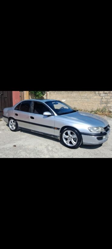 ilkin odenis 1000 azn olan masinlar 2020: Opel Omega: 2 l | 1998 il 216000 km Sedan