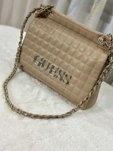 сколько стоит грамм золота в баку: Çiyin çantası, Guess