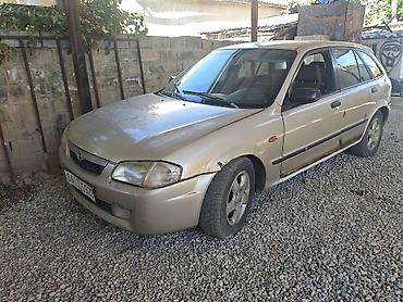 m5 e60 v10: Mazda 323: 2000 г., 1.6 л, Автомат, Бензин, Хэтчбэк — 5