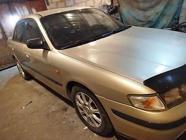 Mazda: Mazda Capella: 1998 г., 1.8 л, Механика, Бензин, Седан — 2