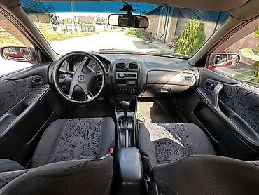 e6 3: Mazda 323: 1999 г., 1.8 л, Автомат, Бензин, Хэтчбэк — 8