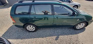с4 2: Toyota Corolla: 2003 г., Механика, Дизель, Универсал — 2