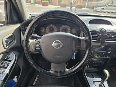 Nissan: Nissan Sunny: 1.6 l | 2010 il Sedan — 12