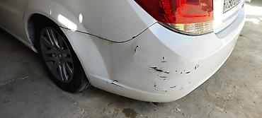 opel astra 2000: Xezer Buferi satilir.ustu azca surtulub gorunduyu kimi.qirigi falan — 2