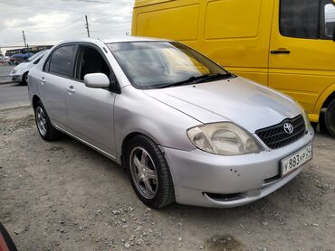 королла тойота: Серебристый седан Toyota Corolla с автоматической коробкой передач