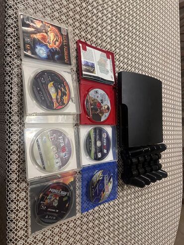 PS3 (Sony PlayStation 3): PlayStation 3 paketi Komplekt: - PS3 konsolu (qara rəng) - 5 ədəd — 3