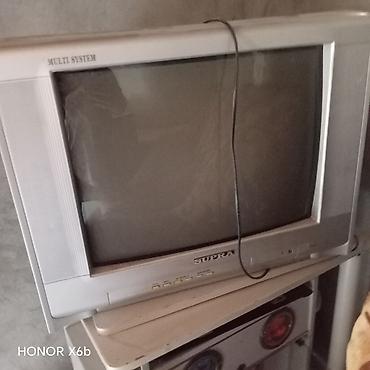 SUPRA kineskop televizor - Ekran: təxminən 21–25 düym, qabarıq