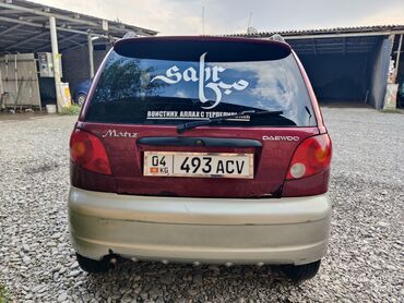 дишевли машина: Автомобиль Daewoo Matiz в двухцветном исполнении кузова – бордовый