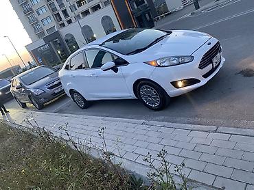 diffuser satisi: Ford Fiesta sedan – ağ rəng, 4 qapı, kompakt sinif. Xarici — 4