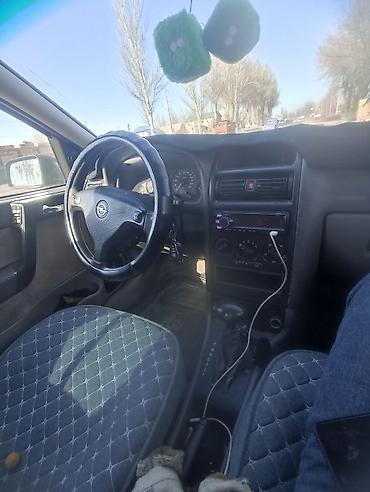 opel astra universal: Opel Astra G, седан/хэтчбек, тёмно‑синий. 1.6. афтамат 2001 300000 — 3