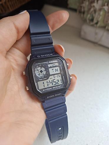 Aksesuarlar: Casio G-Shock rəqəmsal qol saatı - Model: Casio G‑Shock (arxa qapaqda — 4