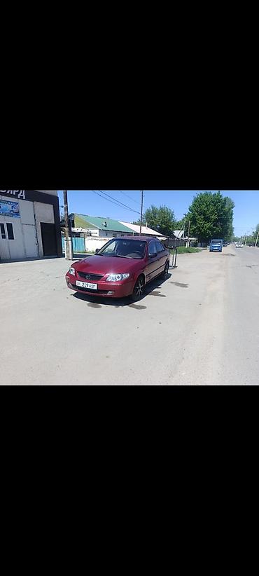 обмен на квартиры: Mazda 323: 2001 г., 1.8 л, Автомат, Бензин, Седан — 4