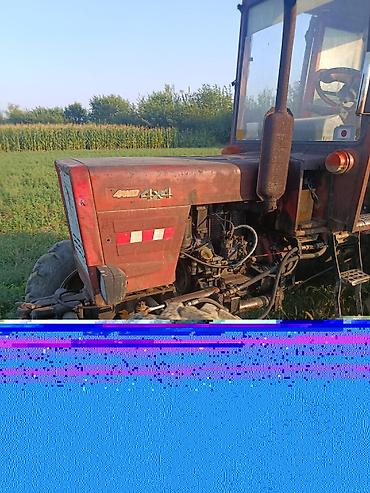 борт на: Трактор полноприводный 4x4, кабина закрытого типа. Характеристики и — 2