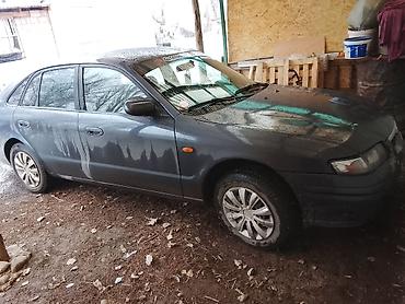 124 2 2: Mazda 626: 1999 г., Механика, Седан — 9