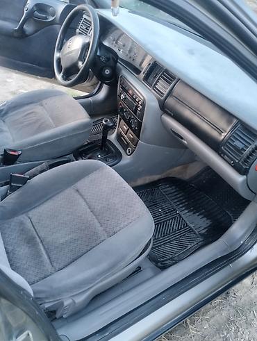 raf 4: Opel Vectra sedan - Kuzov: 4 qapılı sedan, tünd boz rəng - Mühərrik — 10