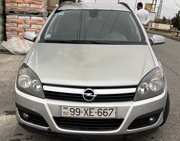 changan uni v: Opel Astra: 1.8 l | 2007 il