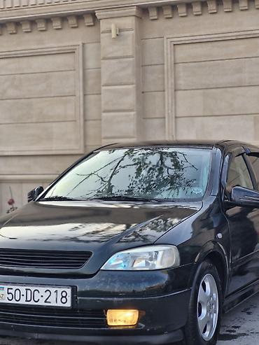Opel: Model: Opel Astra G sedan Kuzov: 4 qapı, tünd yaşıl rəng Mühərrik və — 12