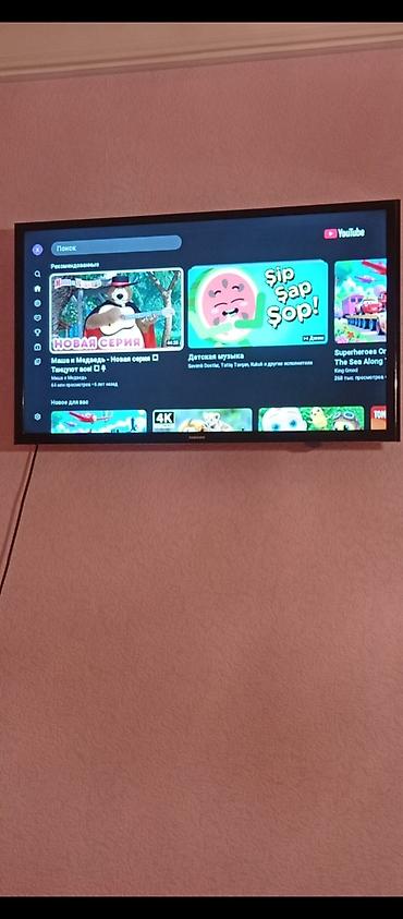 samsung nu7090 55: Samsung Smart TV – divara asılan model - Ekran: təxmini 38– düym — 1