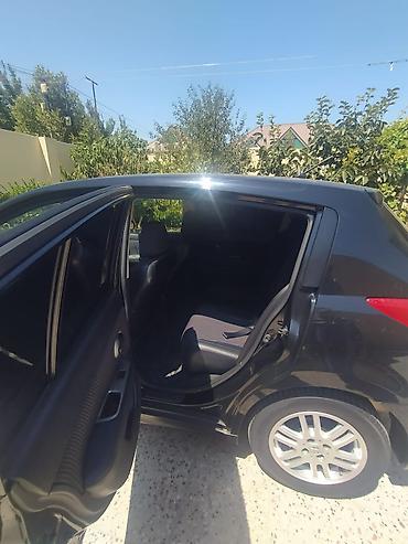 disk: Nissan Tiida hatchback - Kuzov: 5 qapılı hatchback, qara rəng - — 8