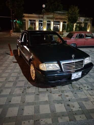 mersedes yan güzgülər: Mercedes-Benz C 200: 2 l | 1997 il Sedan