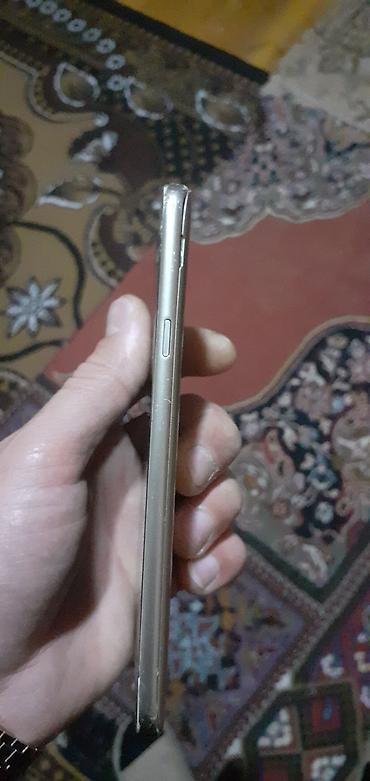 Samsung: Samsung J400, 16 GB, rəng - Qızılı, Sensor — 9