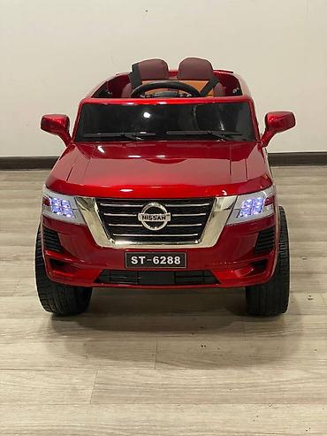 Uşaq üçün elektrik maşınları: Uşaq elektrik cipi "Nissan" M 4837EBLR (4WD tam ötürücülü). İki — 4